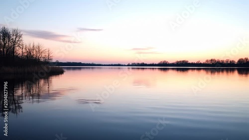 Calm Lake at Sunset with Water Reflection