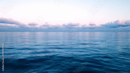 Calm Blue Ocean Horizon Under Soft Sky Video Background