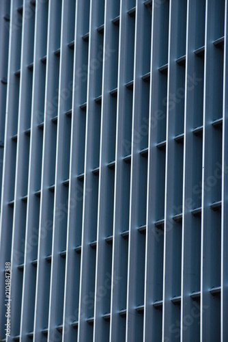Heavy metal grate on building facade
