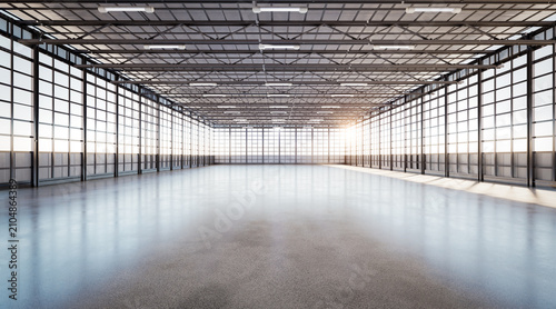 Empty factory interior filled with natural light