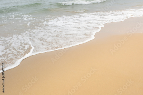 Nature of the ocean and blue sky Summer with sunshine, sandy beaches, clear blue waters sparkling against the blue sky. on an island with good ecology and environment Background for summer vacation	