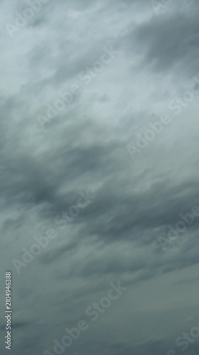Dark storm clouds time-lapse, dramatic nature background for weather and climate news.