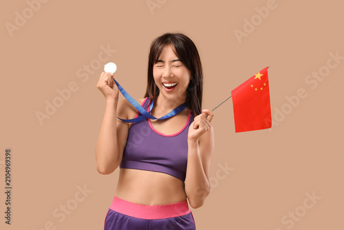 Sporty Asian woman with fir...