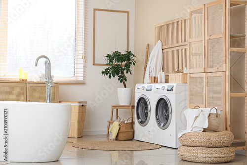 Interior of stylish laundry...