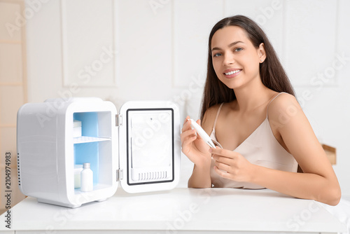 Beautiful young woman with ...