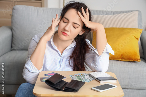 Young woman planning budget...