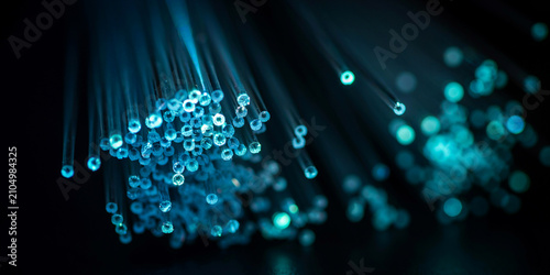 Glowing fiber optic cables transferring digital data with technology communication internet transmission electronic connectivity bandwidth connection infrastructure
