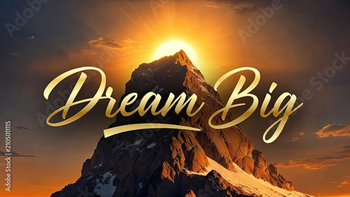 Inspiring mountain sunrise with dream big text overlay a symbol of ambition and hope for new beginnings