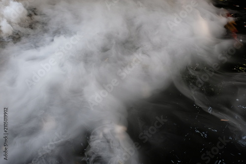Morning Mist Floating Gently Over Still Waters.
Serene Water Veiled in Ethereal Mist.