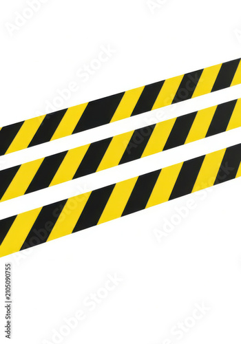 Bright black and yellow caution tape stripes for construction safety barriers isolated white background