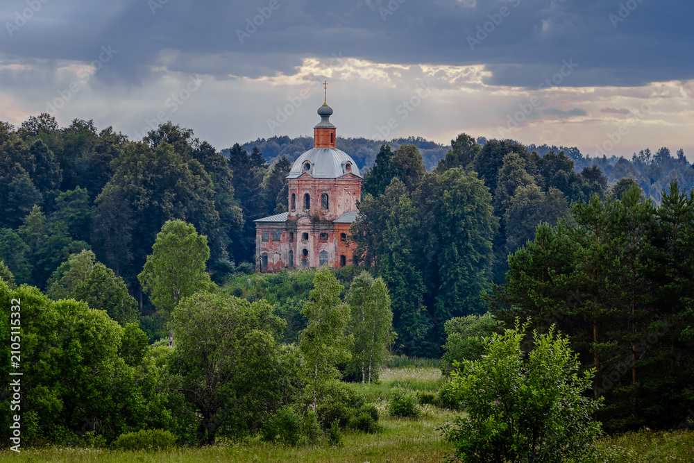 Fototapeta premium Abandoned Smolensk church in a dense forest near the village of Bogoroditskoye, Smolensk region of Russia