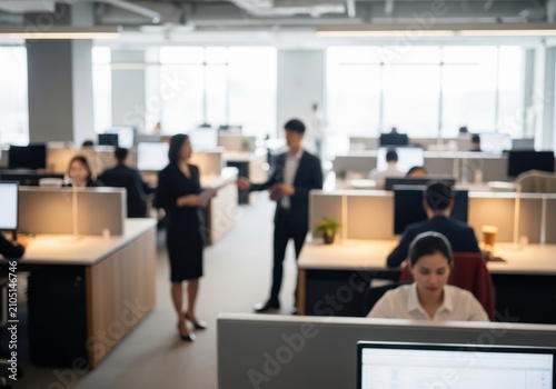 Professional office environment with employees working at desks