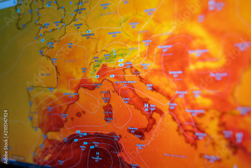 Quadro su tela Angled close-up of a digital screen showing a European weather map with extreme heat
