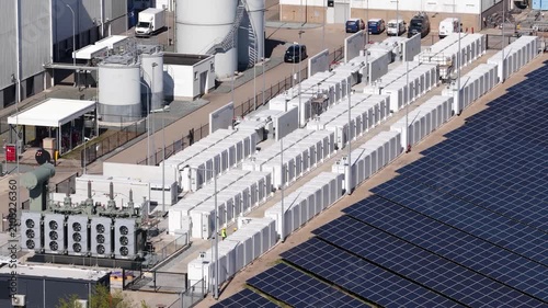 Aerial view of battery storage system next to gas fired power plant
