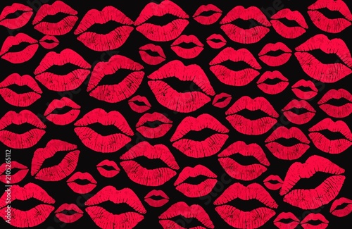 Vibrant neon pink lipstick kisses seamless pattern on black background.