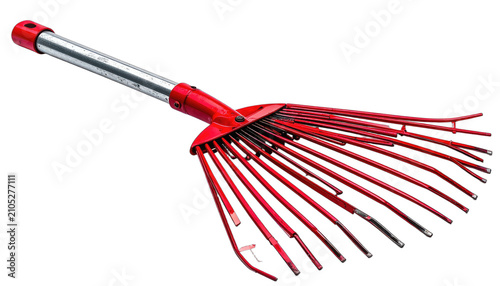 A striking red leaf rake with a metallic handle is presented against a solid black background.