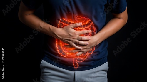 Man experiencing severe intestinal pain and stomach health problems