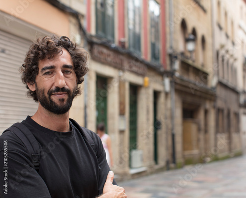 young bearded man enjoying his holidays outdoors