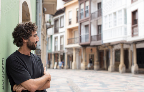 young bearded man enjoying his holidays outdoors