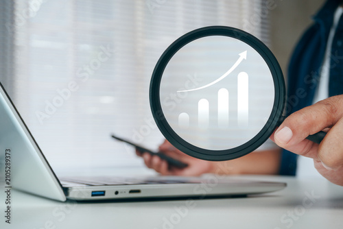 Photography Business professional analyzing digital profit dashboard with virtual financial