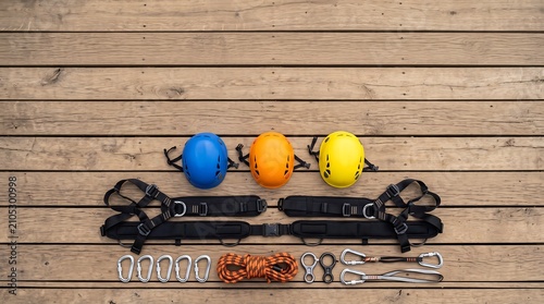Essential Rock Climbing Gear Lay Flat on Wooden Surface