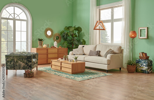 Green living room and wall background concept, wooden furniture, table, chair vase of plant and brown parquet style.