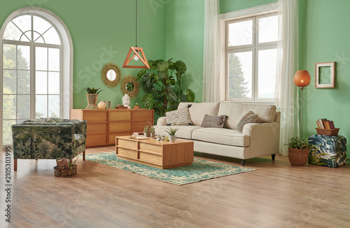 Green living room and wall background concept, wooden furniture, table, chair vase of plant and brown parquet style.