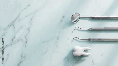 Dental Tools and Tooth on Marble Background