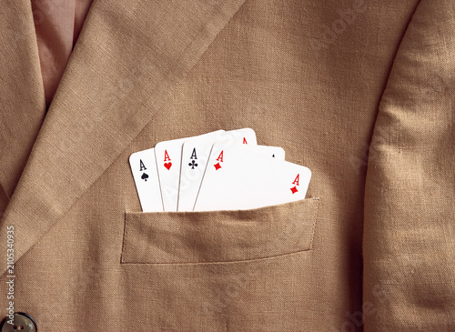 Aces showing in a suit jacket pocket