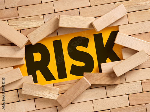 Wooden blocks revealing the concept of risk