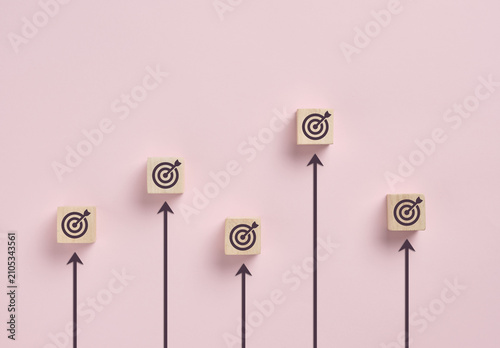 Business goals arrows pointing to growth success