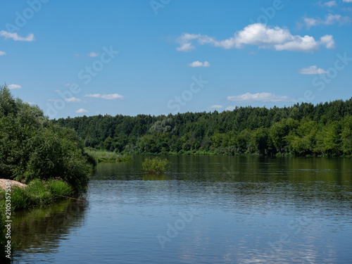 the beauty of the Russian land. The nature of the native land.The forest is a river on a summer day.