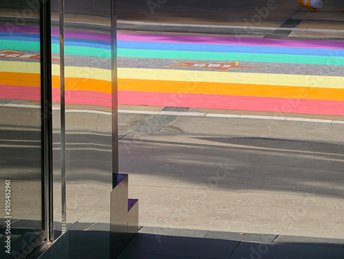 Фотография rainbow road with colorful rainbow flags and rainbow lgbt pride
