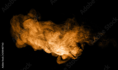 glitter brown dust sand isolated black background. texture wind smoke powder in the desert