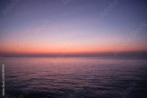 Canvas Print Tranquil Sea Sunset with Calm Water and Pastel Evening Sky