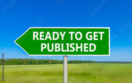 Ready to get published words symbol. Concept words Ready to get published on beautiful green road sign. Beautiful blue sky background. Business ready to get published motivational concept. Copy space
