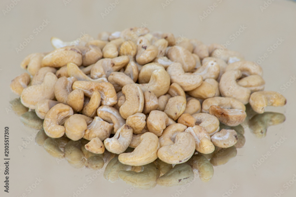 Fototapeta premium Group of cashews on neutral background