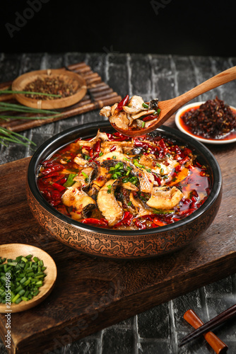 Spicy Blackened Fish Fillets in Red Chili Oil with Asian Seasonings and Vegetables