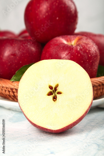 Принти на полотні Fresh Red Fuji Apples from Shaanxi Qin Plateau China with Sliced Apple Cross Sec
