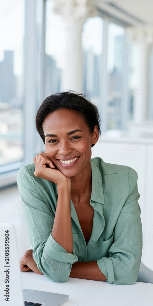 Obraz premium Smiling professional woman in a modern bright office background for business website banner and corporate portrait headshot use