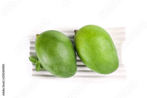 Cuadro en lienzo Fresh Green Kate Mangoes from Panzhihua Sichuan China with Mint Leaves on White