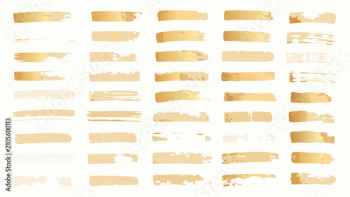 Foto Gold brush strokes pattern arranged in a grid on a white background