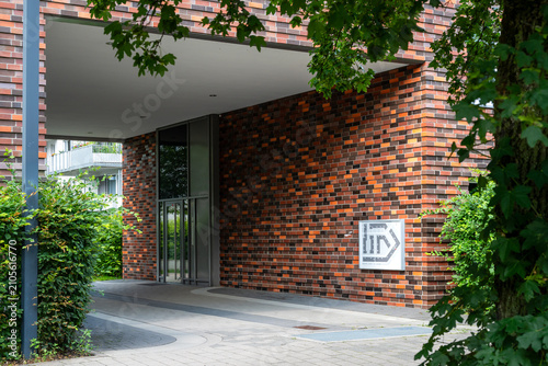 Entrance to a modern apartment building in summer