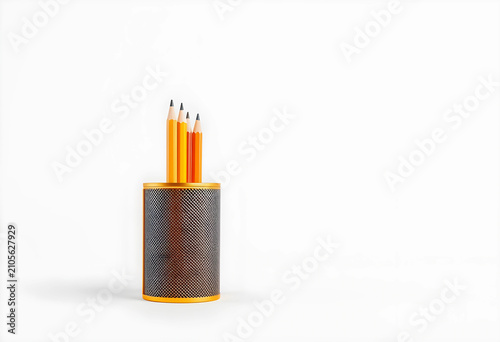 Four yellow wooden pencils ...