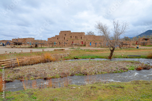 TAOS NEW MEXICO APRIL 20:. The historic Taos Pueblo in Taos NM USA.The adobe walls of mud and straw are typical of native American culture in the region