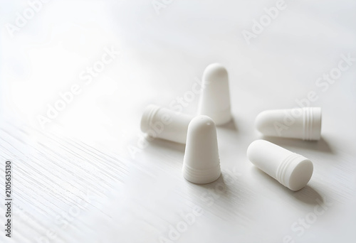 White pencil eraser caps sc...