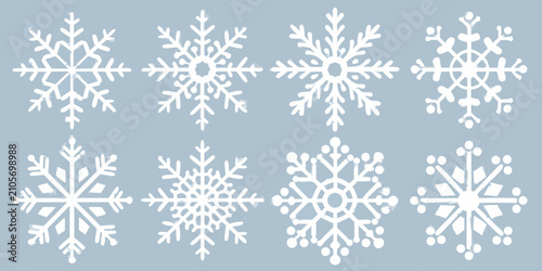 Canvas Print White Snowflake Set Against A Light Blue Background A Winter Design Collection s