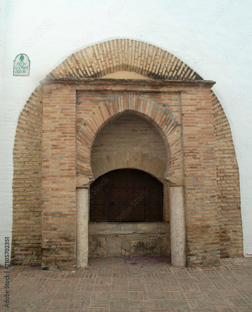 Fototapeta premium 13th century Aljibe de San Miguel Moorish water cistern portal in Albayzin, Granada Andalusia, Spain