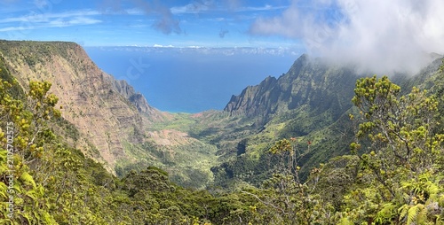 view from the mountain of a hidden tropical valley from a high ridge
