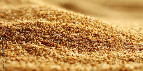 Close-up of finely ground spices on a wooden surface